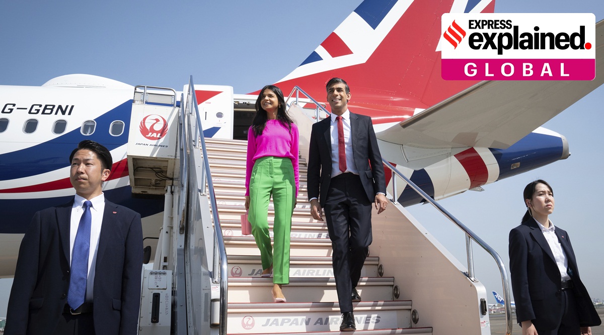 British Prime Minister Rishi Sunak, center right, and his wife Akshata Murty disembark their plane as they arrive at the airport, in Tokyo, Japan.