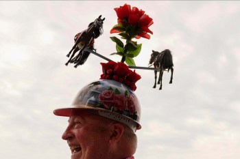 AP PHOTOS: Kentucky Derby hat styles: Bigger is often better