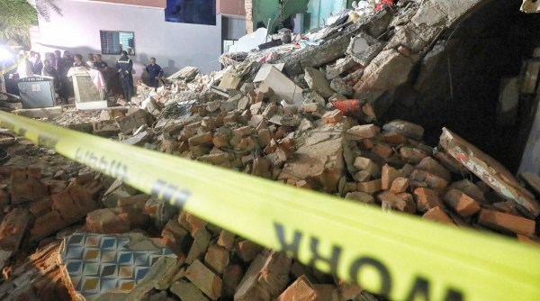 Three storeyed building collapsed near Sonal cinema, Vejalpur on Thursday night. Express photo by Nirmal Harindran