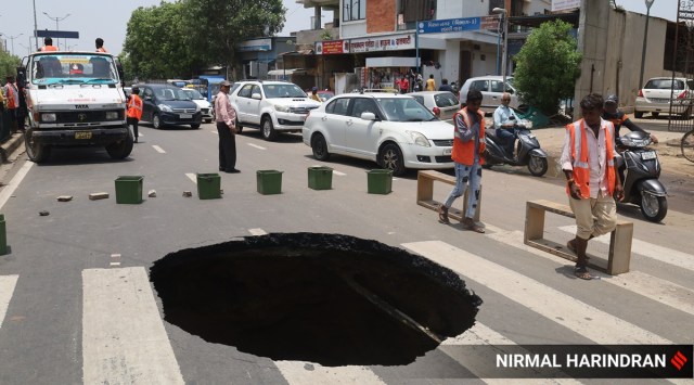 A day after heavy rain, Ahmedabad woke up to cave-ins, water-logging ...