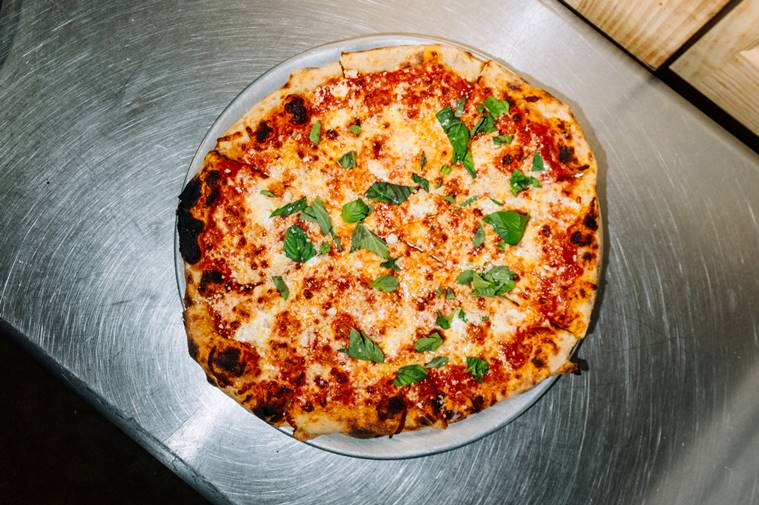 A pizza from Wizard Hat Pizza in Brooklyn, April 23, 2023. (DeSean McClinton-Holland/The New York Times)