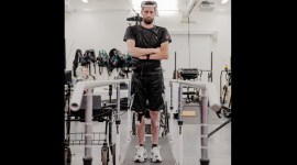 A paralyzed man can walk naturally again with brain and spine implants