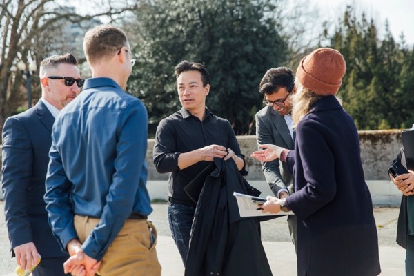 Mayor Ken Sim of Vancouver, center, during a news conference in Vancouver, B.C., Canada, on March 16, 2023. Sim has dismissed suspicions that he is influenced by his cousin Bernard Chan, a politician and businessman who was a top adviser to Carrie Lam, Hong Kong’s former pro-Beijing chief executive. (Jackie Dives/The New York Times)