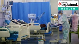 Nurses and health workers attend critical covid positive patients inside an ICU facility run by Navi Mumbai Municipal Corporation during the second wave of the pandemic.