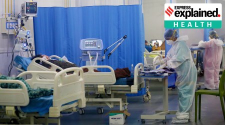 Nurses and health workers attend critical covid positive patients inside an ICU facility run by Navi Mumbai Municipal Corporation during the second wave of the pandemic.