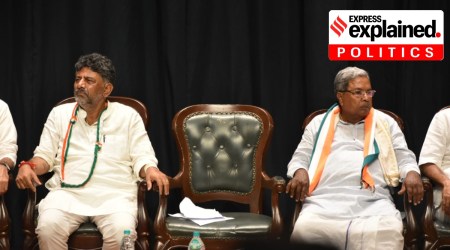 Congress leaders DK Shivakumar (left) and Siddaramaiah (right) seated with an empty chair between them, during the press meet at KPCC Bengaluru on Saturday, May 13.