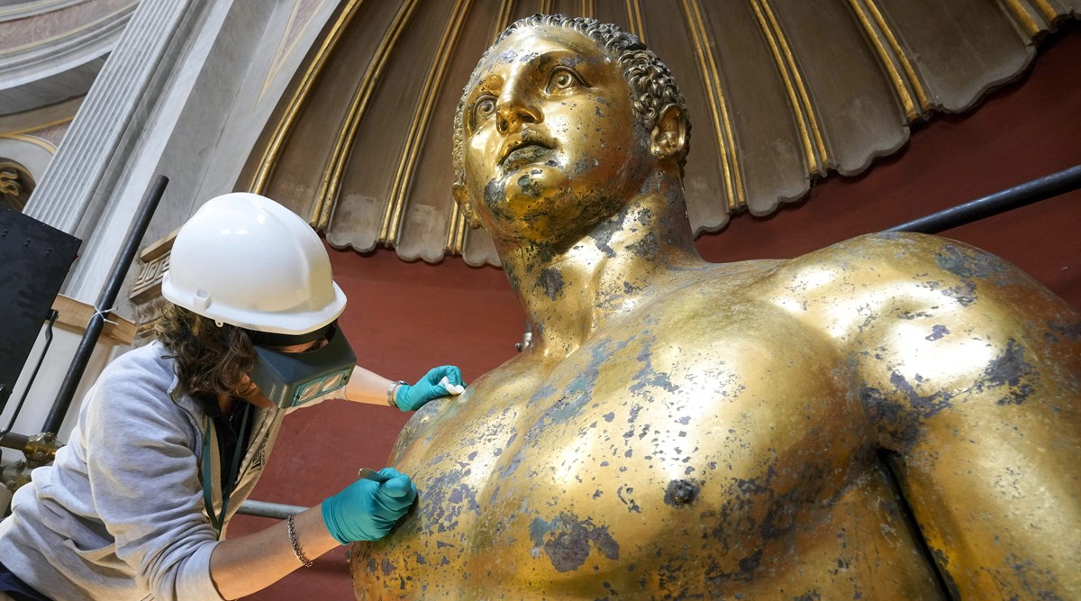 Vatican experts uncovering gilded glory of Hercules statue struck by