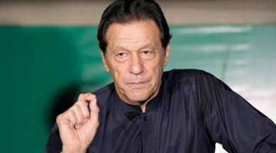 Pakistan's former Prime Minister Imran Khan gives a press conference at his home, in Lahore, Pakistan, May 18, 2023. (AP)