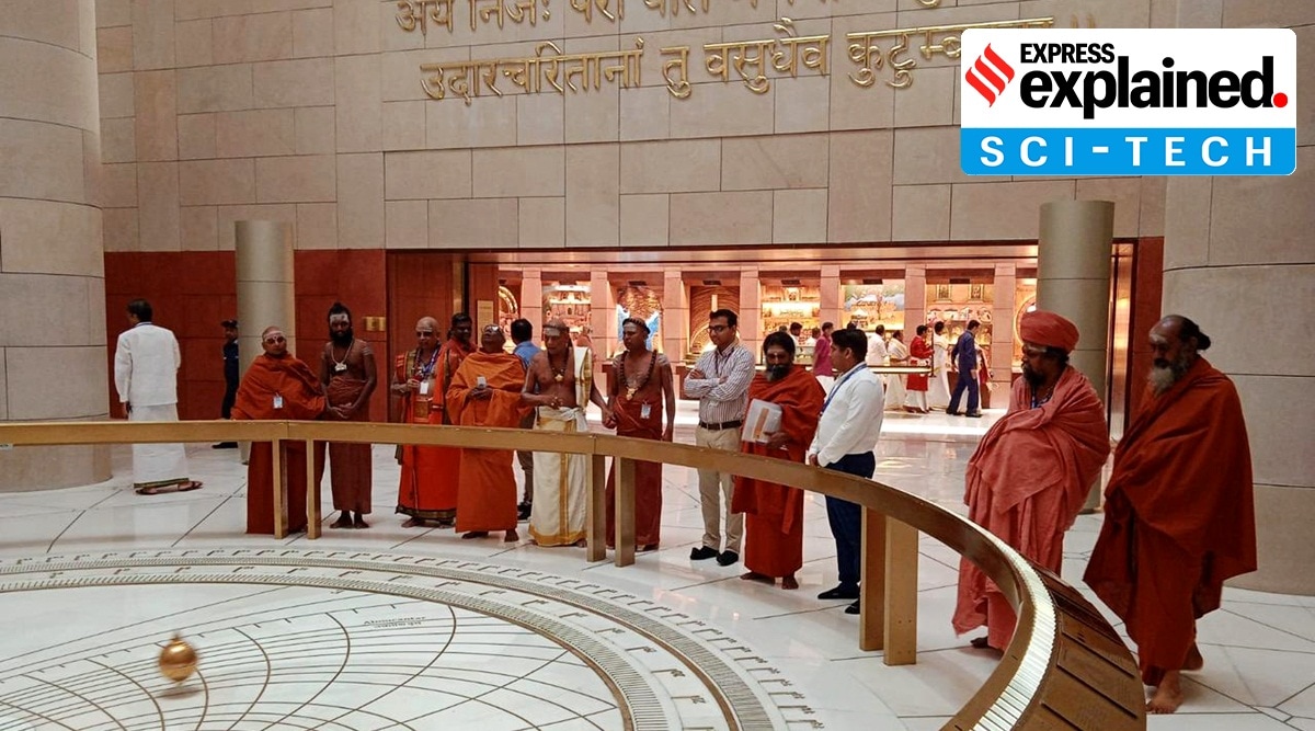 Religious leaders watch the pendulum in the new Parliament.