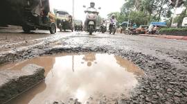 Mumbai potholes, BMC, Brihanmumbai Municipal Corporation BMC, Mumbai news, Maharashtra, Indian Express, current affairs
