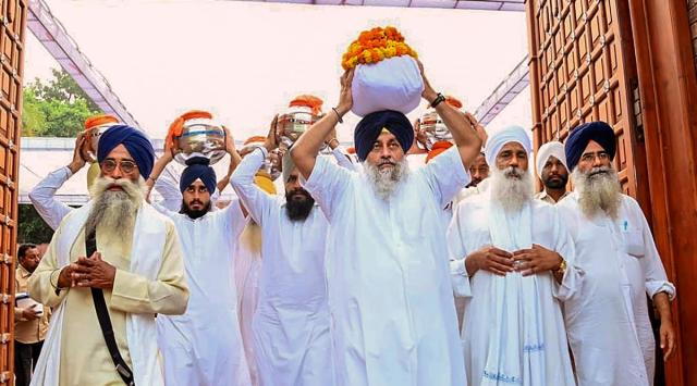 With An Urn Containing Parkash Singh Badals Ashes Sukhbir Badal