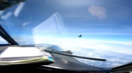In this image from video provided by the US Navy, a Chinese J-16 fighter flys close to a US RC-135 aircraft flying in international airspace over the South China Sea on May 26, 2023. (US Navy via AP)
