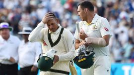 Australia's Usman Khawaja (left) and Scott Boland.