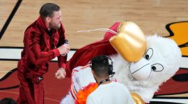 Conor McGregor punches Burnie, the Miami Heat mascot.