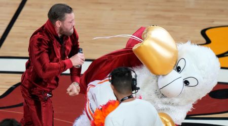 Conor McGregor punches Burnie, the Miami Heat mascot.