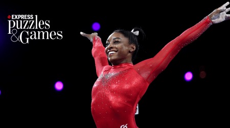 Simone Biles lands a vault at the Olympics.