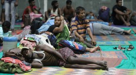 Families evacuated from coastal areas at a shelter in Gandhidham , Kutch, on Tuesday. Nirmal Harindran Gujarat shifts 37,000 to shelters as Biparjoy nears, 1 dies in wall collapse