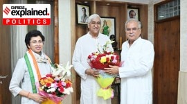 Chhattisgarh CM Bhupesh Baghel gives a bouquet to Minister TS Singhdeo after he was appointed deputy CM. Party's state in-charge Shelja Kumari is also pictured.