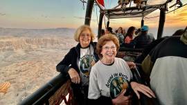 Eleanor Hamby and Dr. Sandra Hazelip on a hot air balloon ride over the Valley of the Kings in Luxor, Egypt. (Eleanor Hamby via The New York Times)