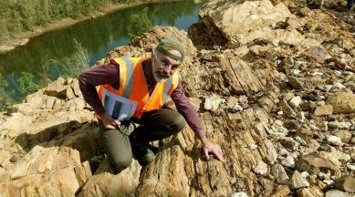 Professor Jochen Brocks inspects 1.64 billion year old sediments for molecules of the Protosterol biota in Barney Creek, Northern Australia