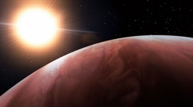 illustration of the planet wasp-69 b and its star