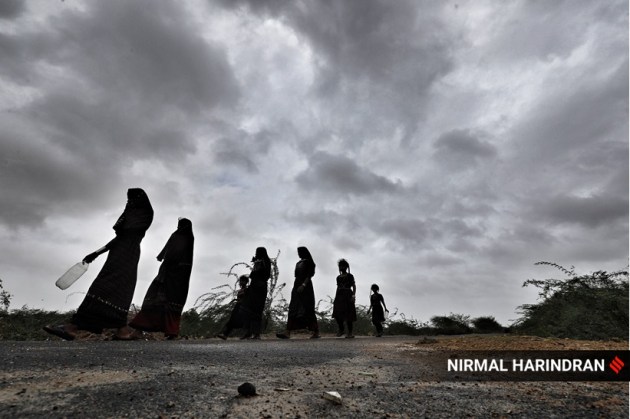 Women walking back to a cyclone shelter