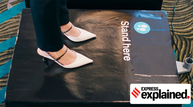 In this photo supplied by Air New Zealand, a woman stands on scales to be weighed ahead of a flight in Auckland, New Zealand on May 29, 2023.