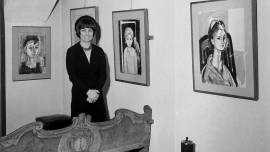 Artist Francois Gilot poses with her work at a personal art exhibition in Milan, Dec. 21, 1965. (AP Photo, File)