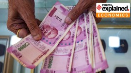 A shopkeeper counts Rs 2,000 rupee currency notes at a jewellery shop in Mumbai, Tuesday, May 23, 2023.