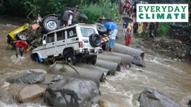 Damaged vehicles after they got swept away in floodwater following heavy rainfall, in Kullu, Sunday, June 25, 2023.
