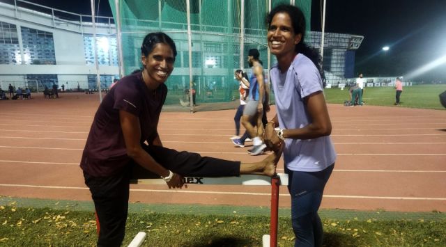 Vithya Ramraj (right) with her twin sister Nithya.