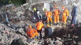 Two people trapped inside the building, which collapsed partially on Sunday as the monsoon arrived in the city, of Mumbai’s Ghatkopar (East) have died.(Twitter/@5Ndrf)