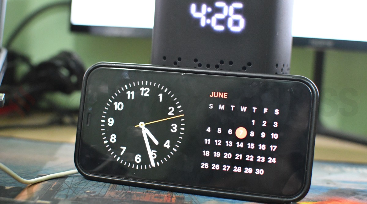 iOS 17 StandBy mode overview: iPhone slips into a digital clock & gallery  with ease