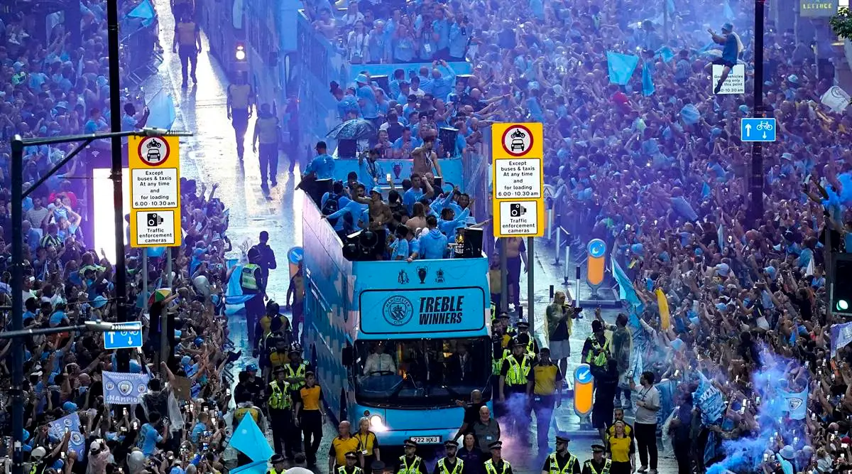 Watch: Manchester City celebrates winning treble of major trophies with open