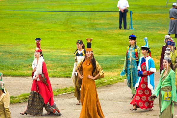 Beautiful Mongolian women dressed in variety of traditional national costumes. Picture: Shutterstock 