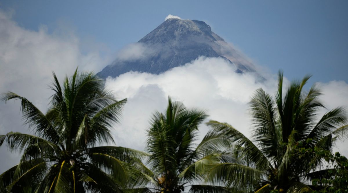 philippines-mayon-volcano-spews-lava-down-its-slopes-in-gentle