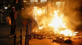 Fourth night of riots after teenager shot dead by police in Paris suburb