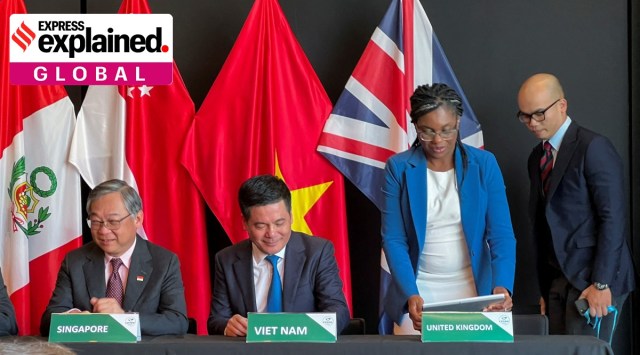 Singapore's Minister for Trade and Industry Gan Kim Yong, Vietnam's Minister of Trade and Industry Nguyen Hong Dien and British Secretary of State for Business and Trade Kemi Badenoch are seen together.
