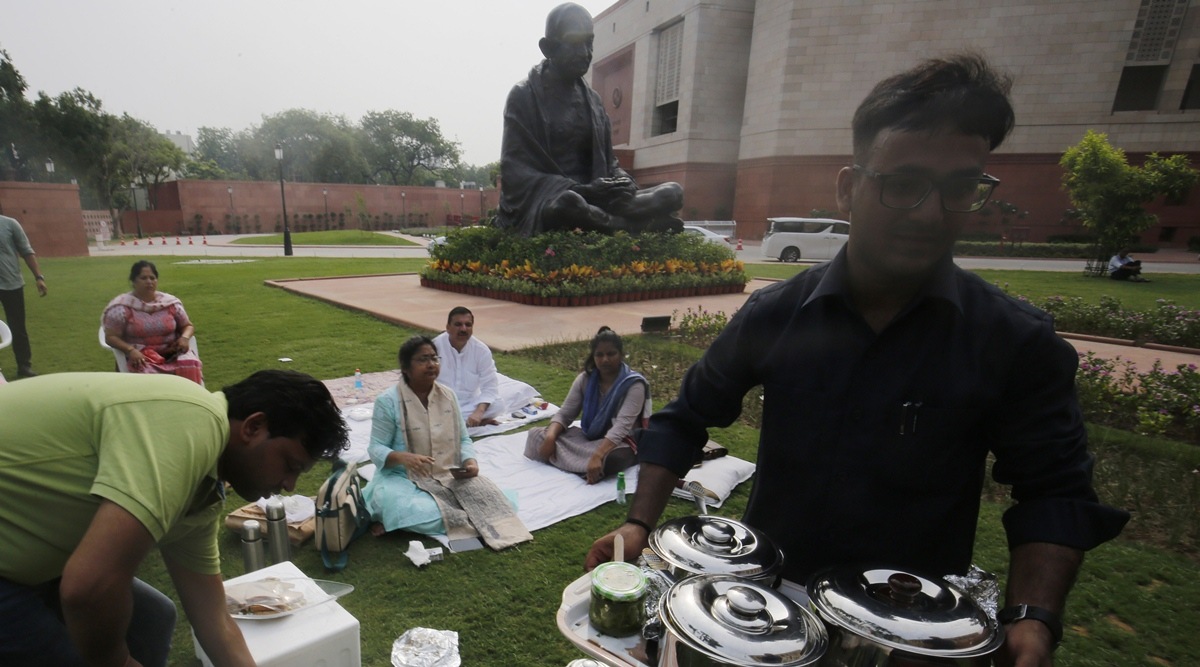 Songs, home food, Gandhi statue by their side, Opposition members rally