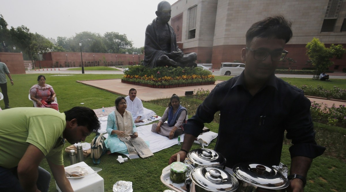 Songs, home food, Gandhi statue by their side, Opposition members rally ...