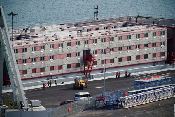 Barge to house asylum-seekers arrives in UK as Parliament passes ...