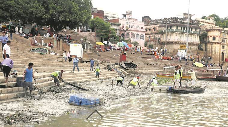 PM Modi Varanasi visit, PRIME MINISTER Narendra Modi, PM Modi Parliamentary constituency, foundation stones of Rs 3,000 cr projects, Yogi Adityanath review meeting, Manikarnika Ghat redevelopment work, UP development projects, indian express, indian express news