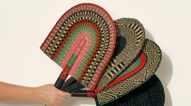 When temperatures rise from steamy to sweltering, as they have lately in much of the world, pulling out a fan can make a more universal statement: It's way too hot out. (Source: Goodee via The New York Times)