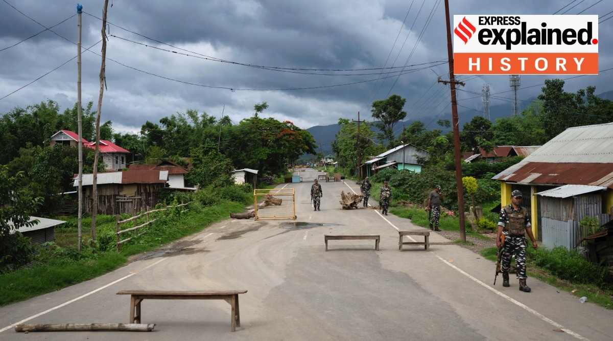 Indian paramilitary soldiers patrol a deserted street at a de facto frontline which dissect the area into two ethnic zones in Kwakta, near Churachandpur, some 50 kms from Imphal, capital of Manipur, on Thursday, June 22, 2023.