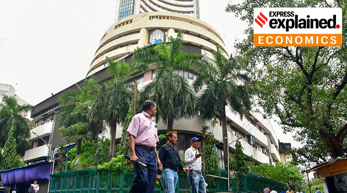 Pedestrians walk past the Bombay Stock Exchange (BSE) building, in Mumbai, Wednesday, June 28, 2023.