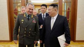 North Korea's Kim shows off banned missiles to Russian minister.