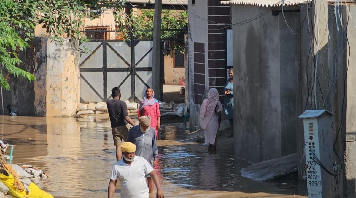 Punjab rains: Villagers protest water entering their fields, block NH ...