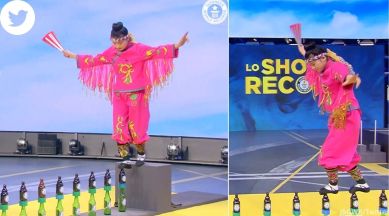 Woman from China walks on glass bottles stacked on glass bottles to break world record