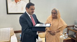 Adani meets Bangladesh PM, adani Sheikh Hasina meeting, Adani Group Chairman Gautam Adani, 1,600 MW USCTPP project, Adani Group entry into transnational power project, first commissioned transnational power project, indian express, indian express news