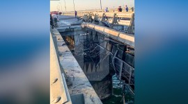 This photo released by Ostorozhno Novosti on Monday, July 17, 2023, reportedly shows damaged parts of an automobile link of the Crimean Bridge connecting Russian mainland and Crimean peninsula over the Kerch Strait not far from Kerch, Crimea.
